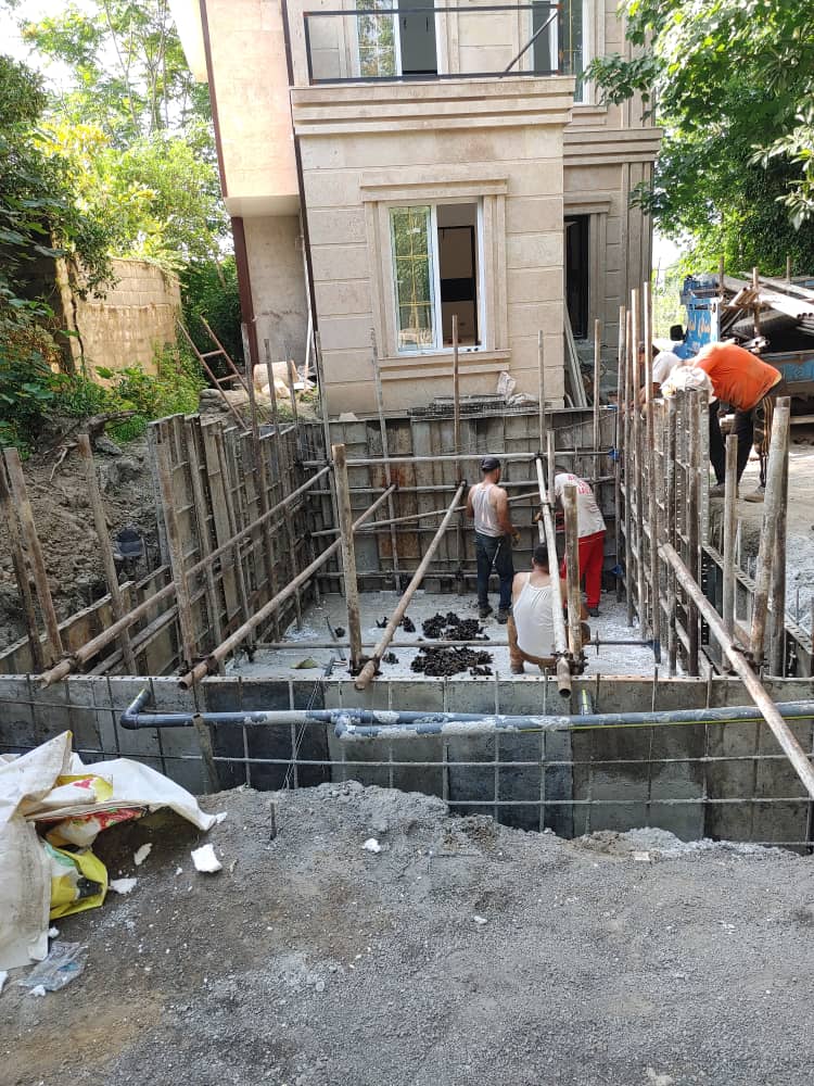 A building with a pool in construction